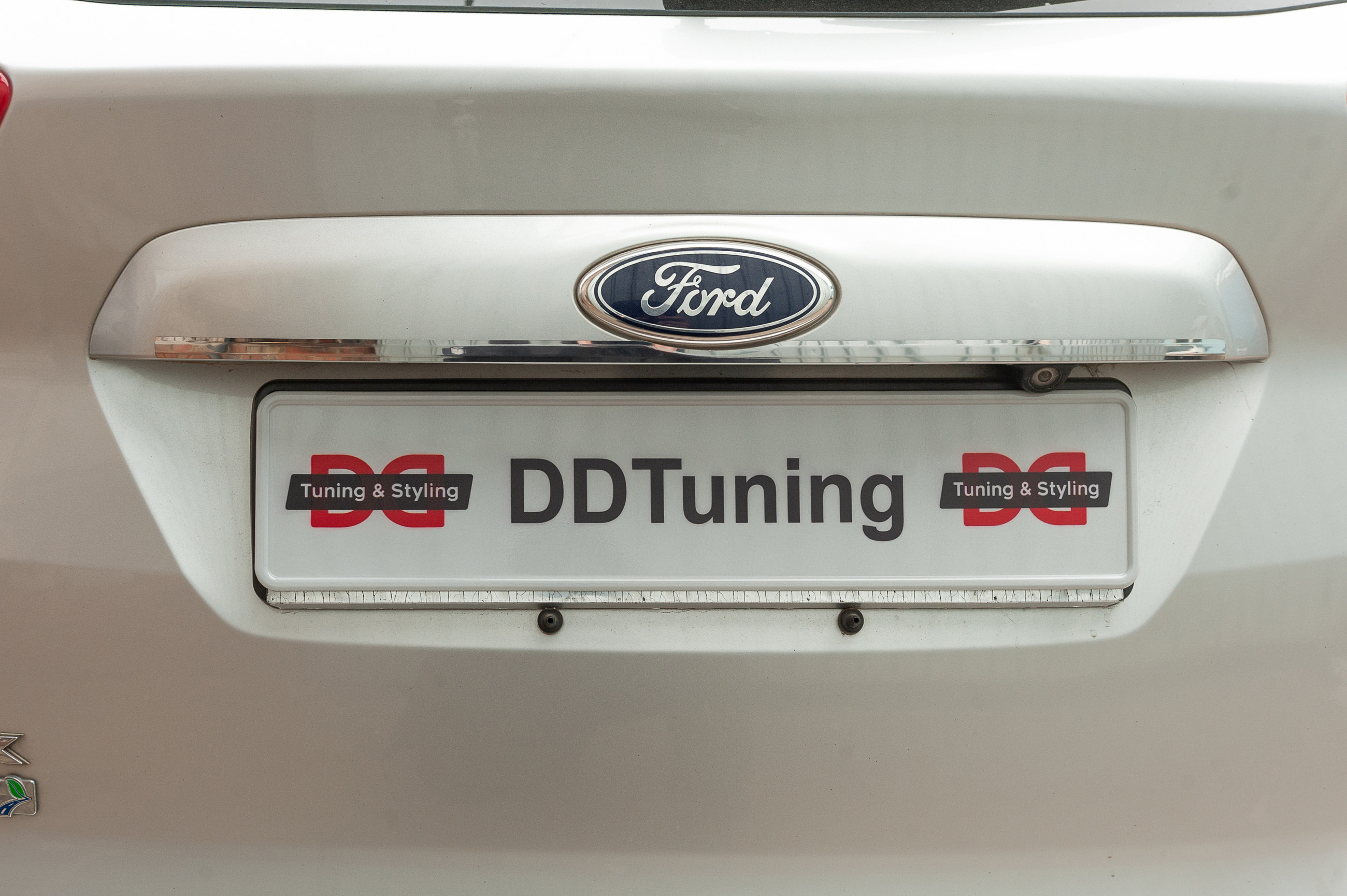 Планка над номером Carmos (нерж.)