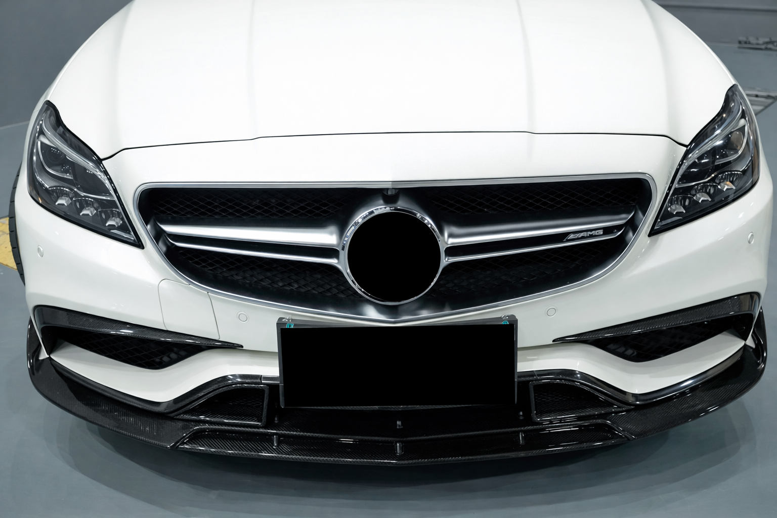 Накладки на передній бампер (для CLS63 AMG SD 2015-2018, Карбон) 2