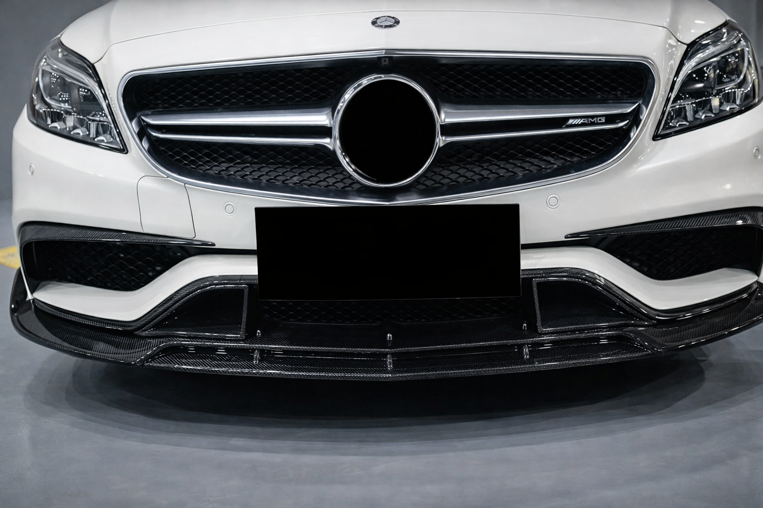 Накладки на передній бампер (для CLS63 AMG SD 2015-2018, Карбон) 6